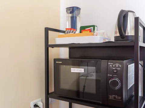 Microwave and kettle on a trolley