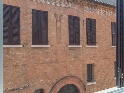 Brick façade seen from a window