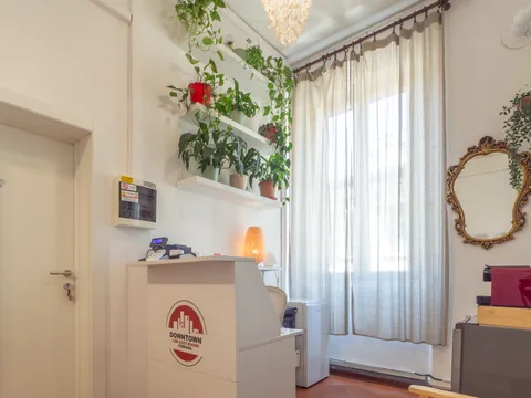 Furnished corner beside a window